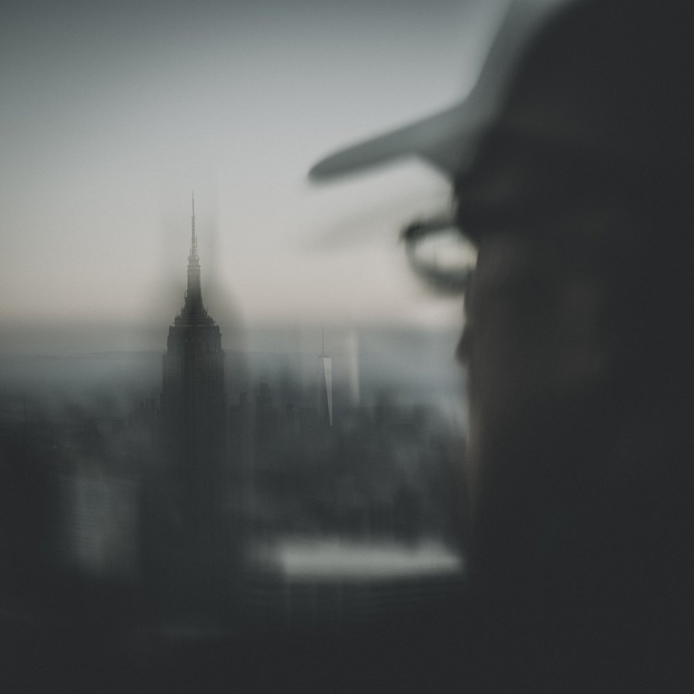 Man Overlooking New York
