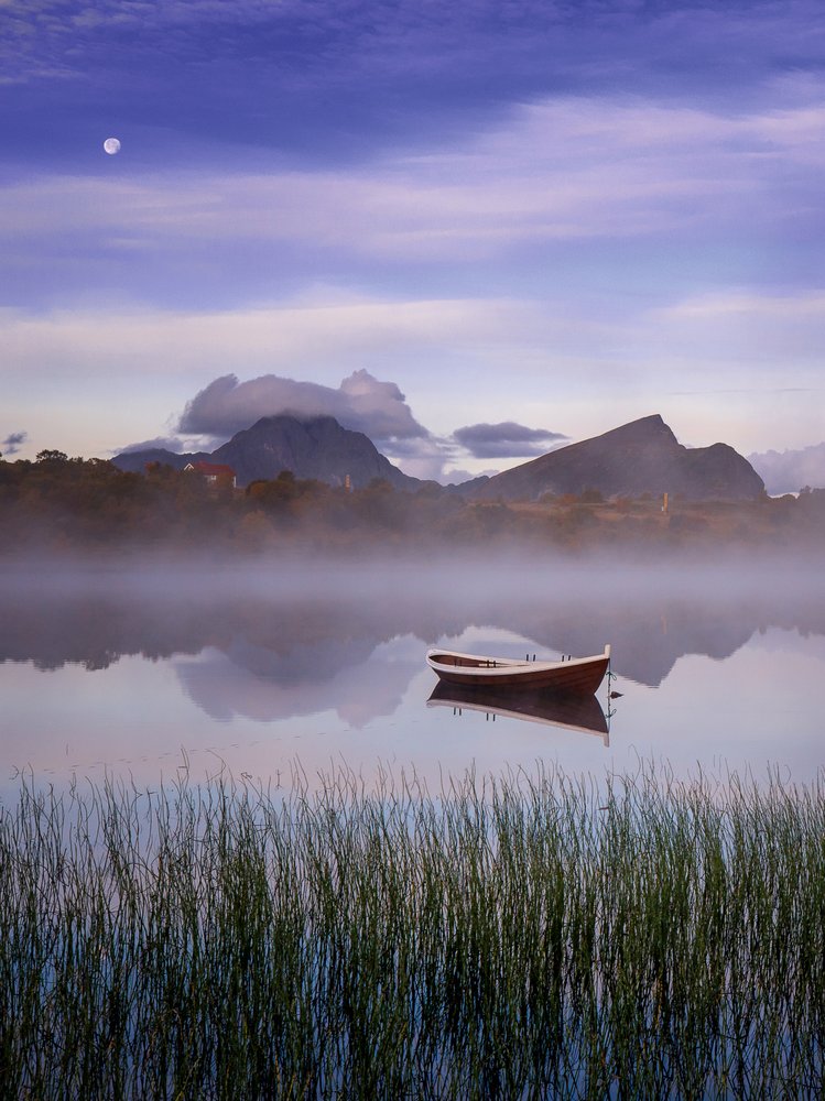 Serene Boat on Misty Lake