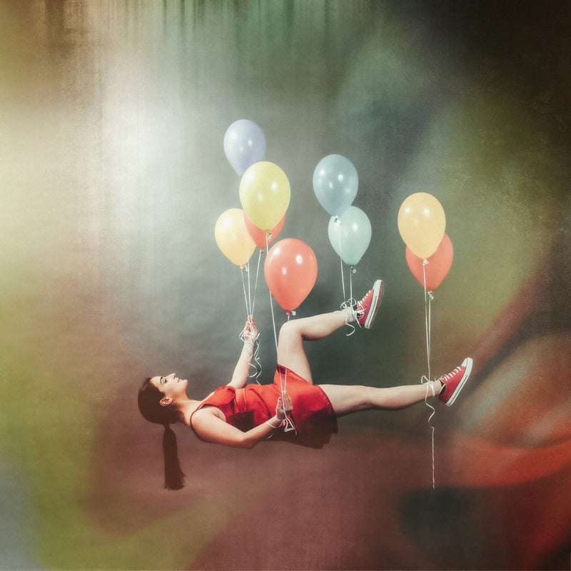 Whimsical Girl Floating Balloons