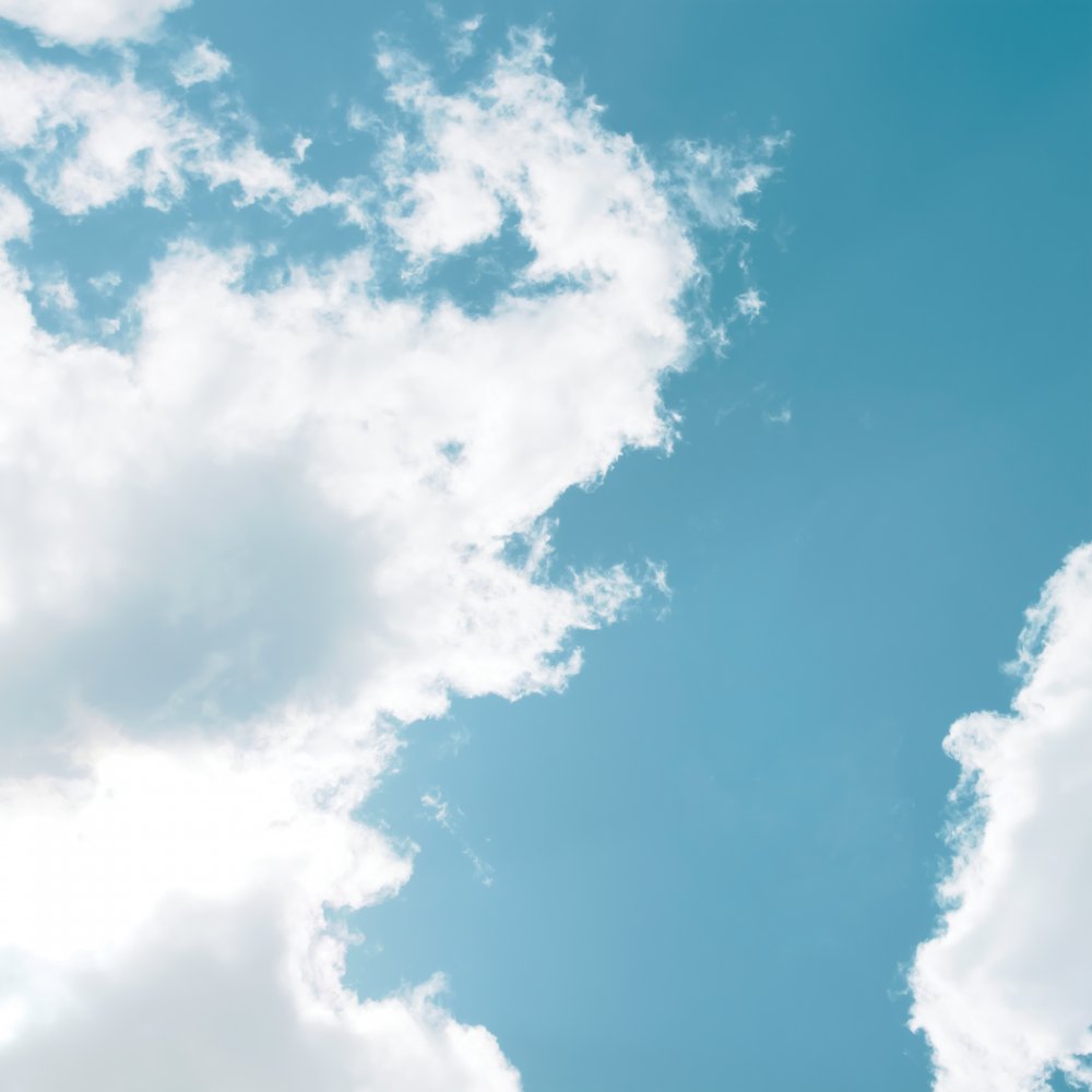 Fluffy Clouds Blue Sky