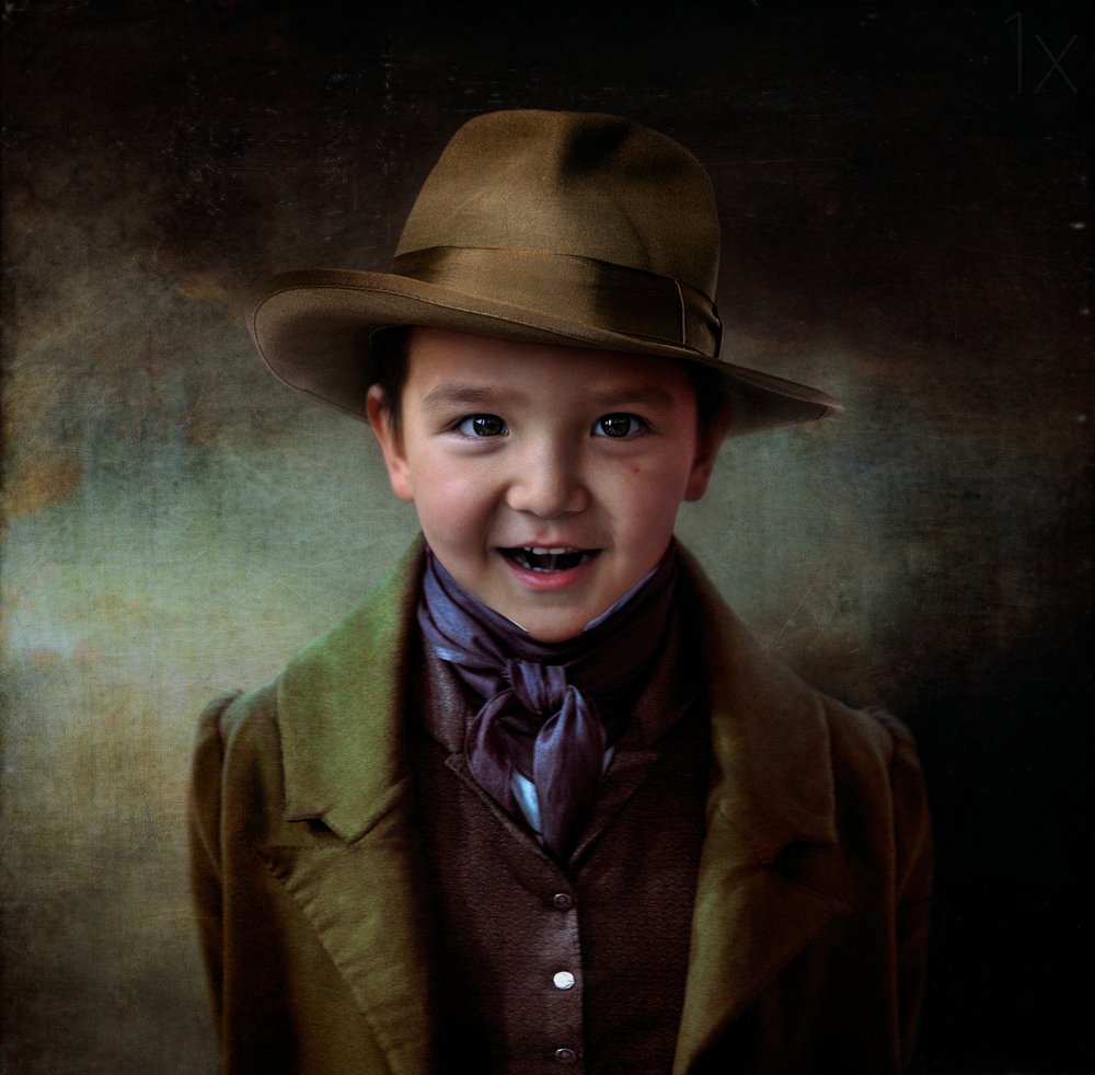 Smiling Boy in Hat