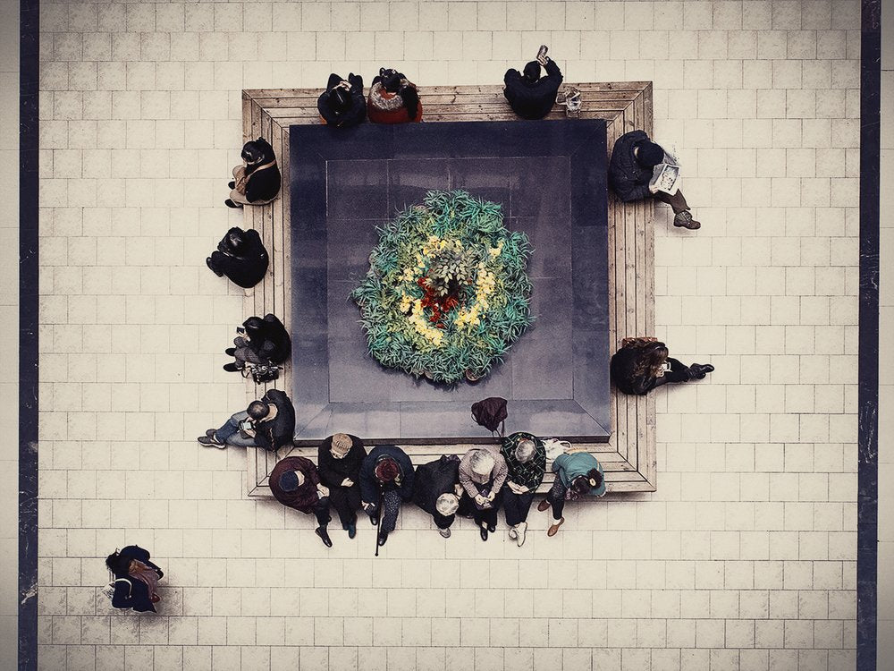People Around Green Wreath