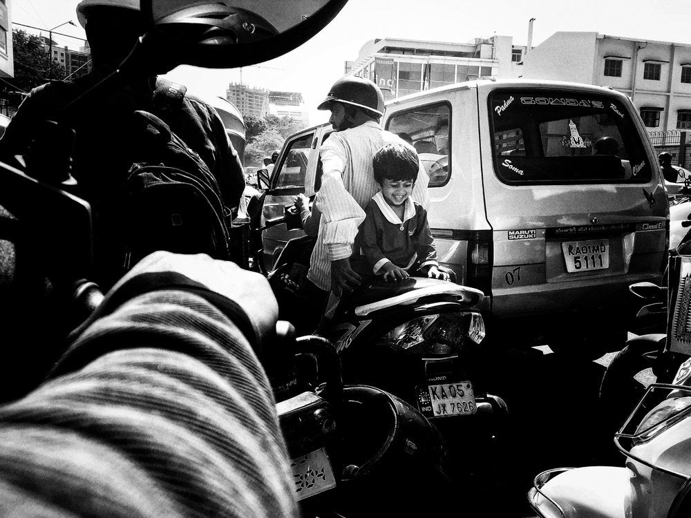 Smiling Boy City Ride