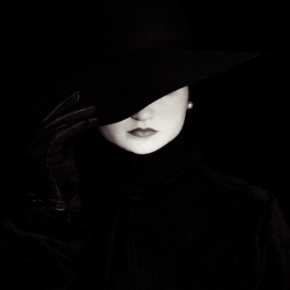 Mysterious Woman in Hat