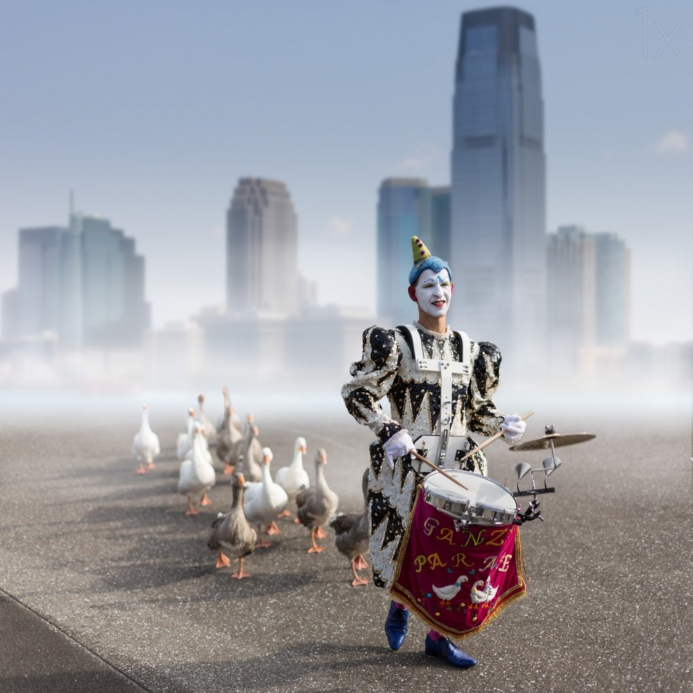 Clown Leads Geese Parade