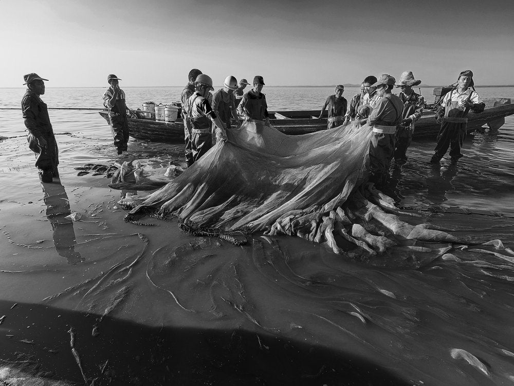 River Fishermen At Work