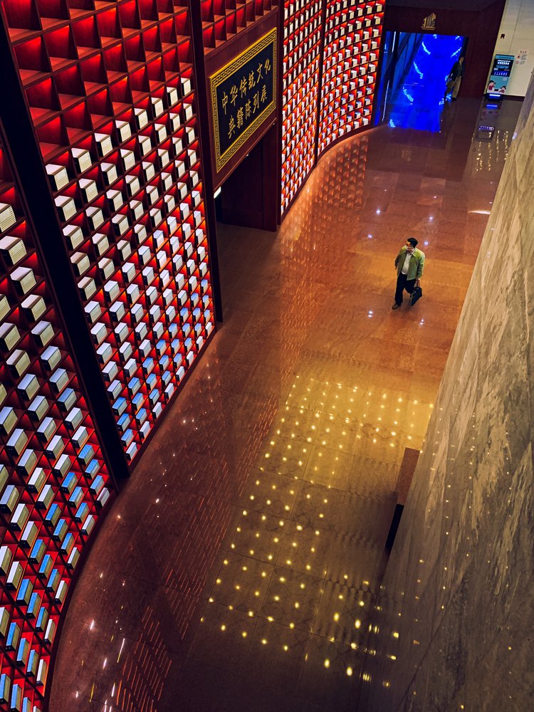 Vibrant Red Hallway Reflections