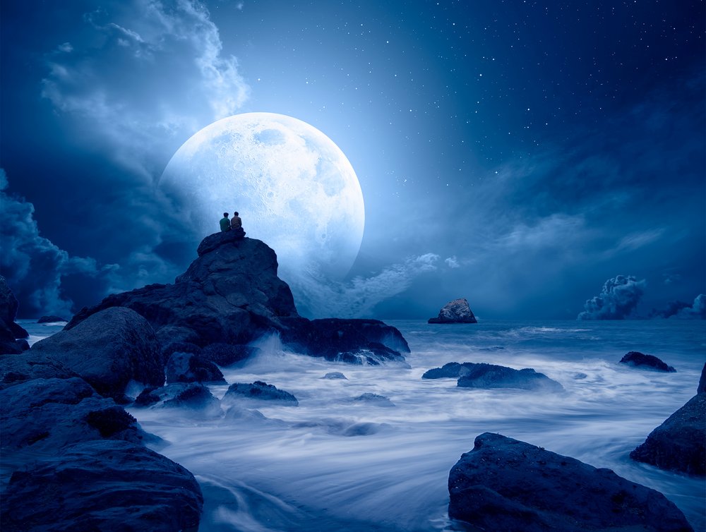 Couple Under Full Moon