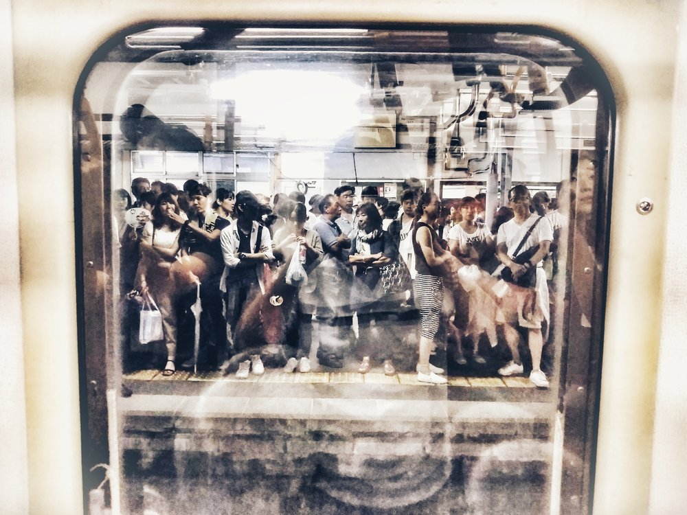 Commuters Through Window