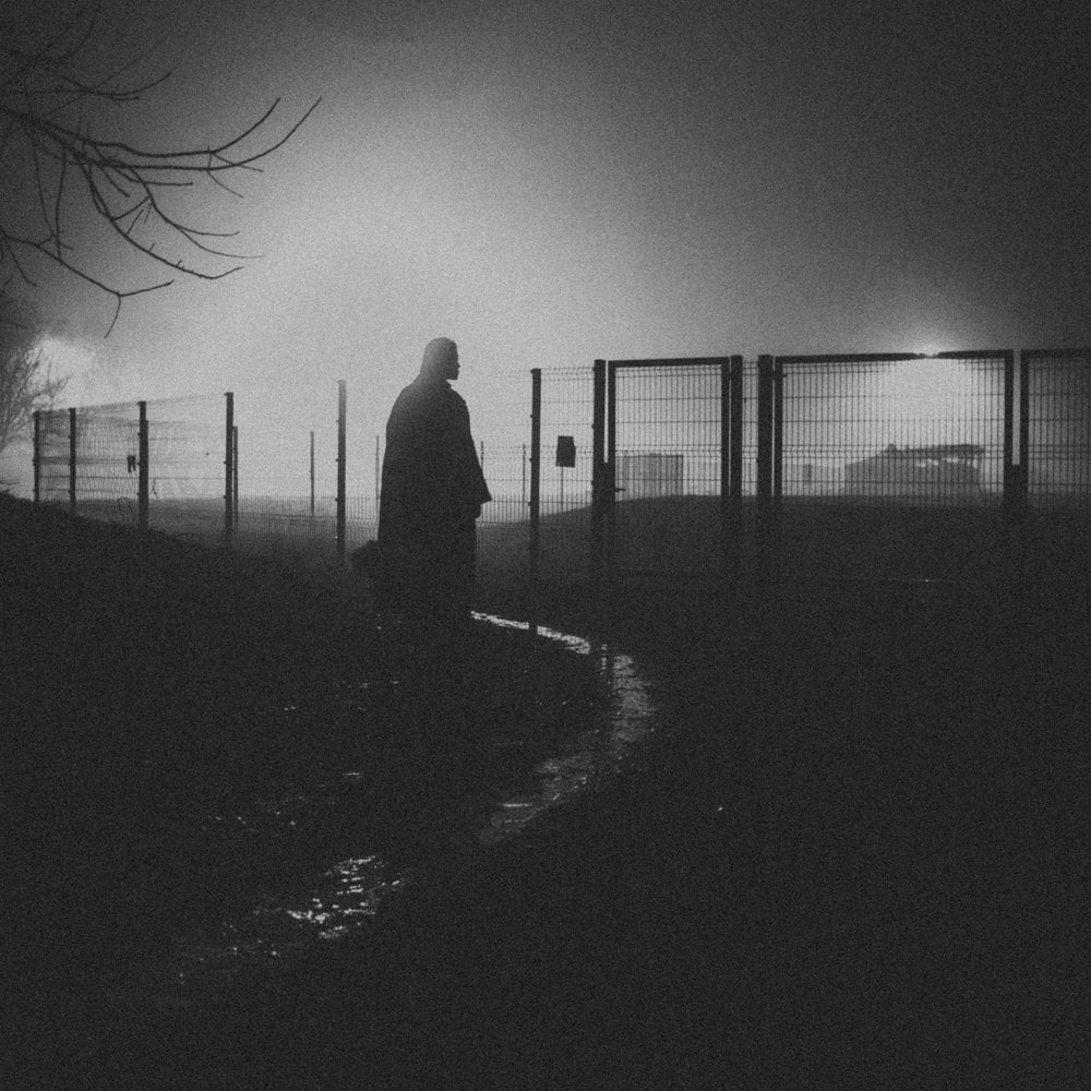 Solitary Figure Dark Gates
