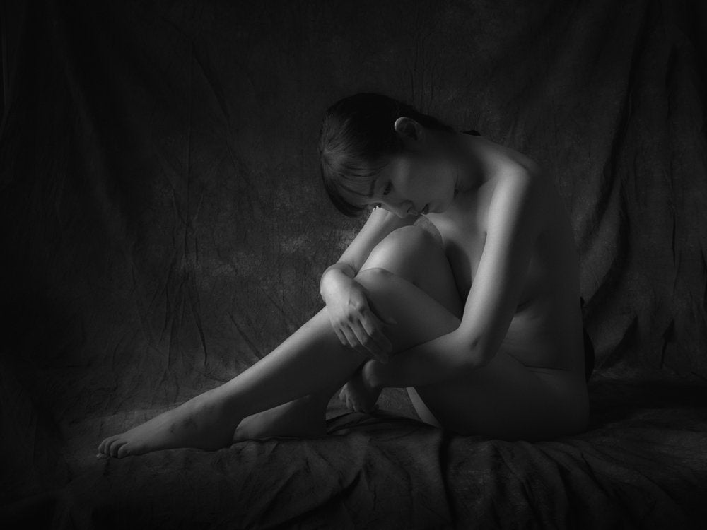 Thoughtful Nude Figure