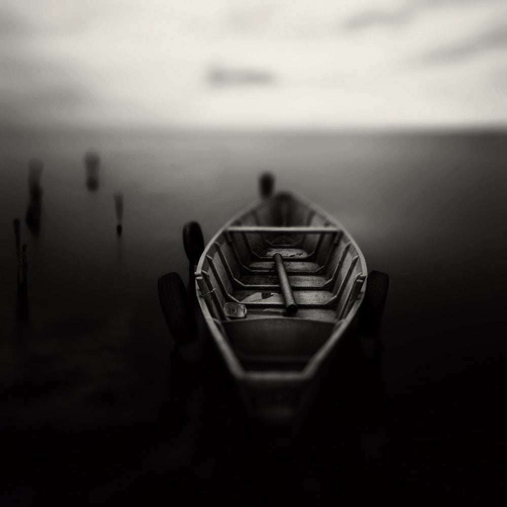 Timeless Boat on Dark Water