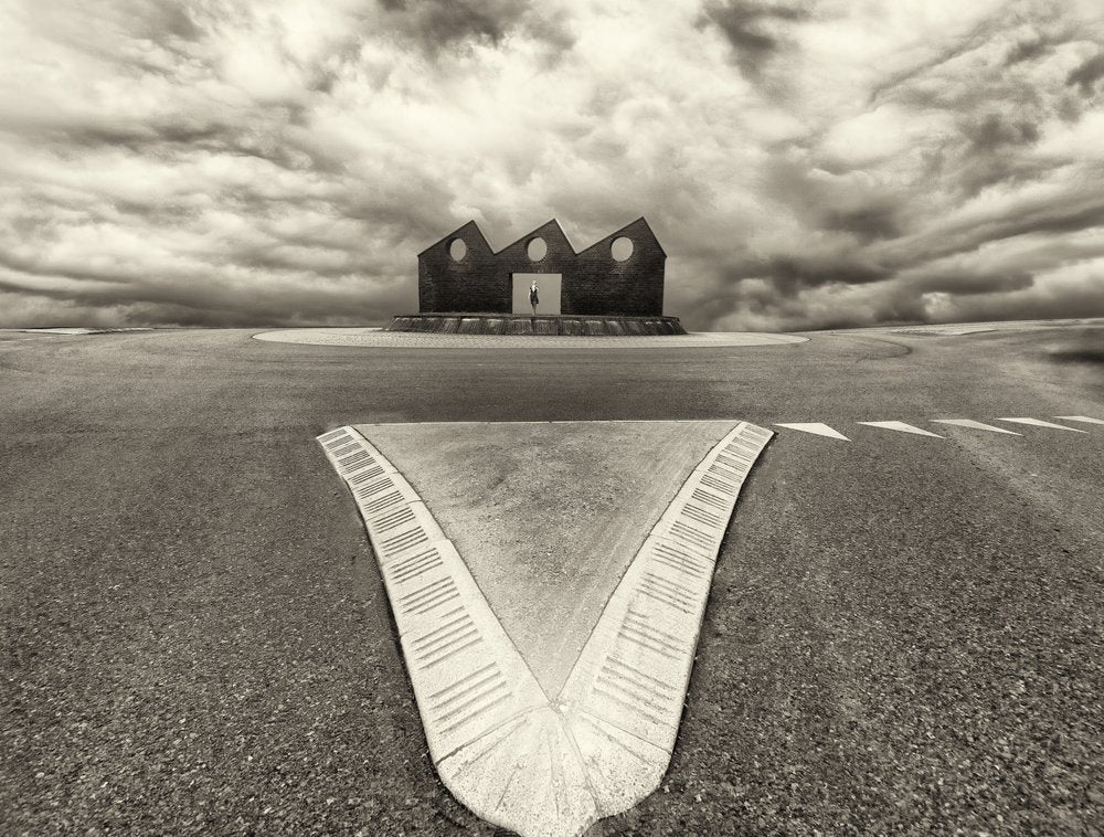 Converging Roads Solitary Building