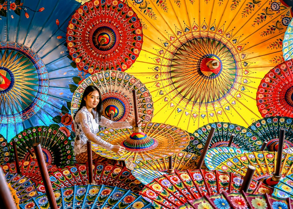 Balinese Woman Vibrant Umbrellas