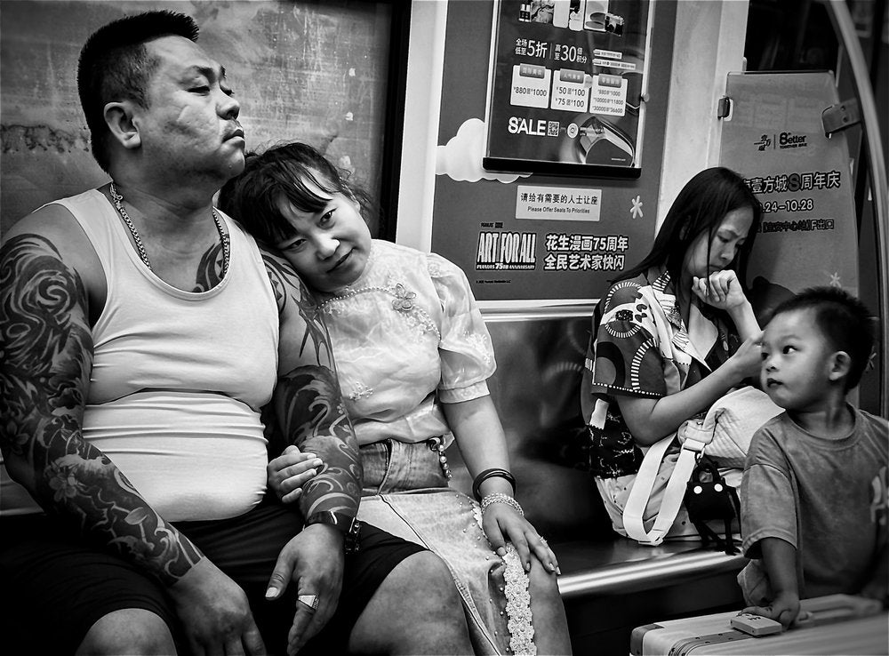 Tattooed Subway Passengers