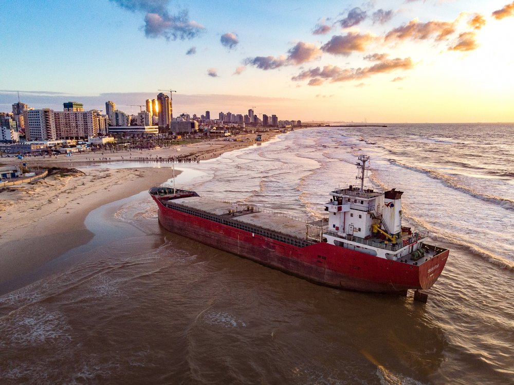 Stranded Ship City Sunset