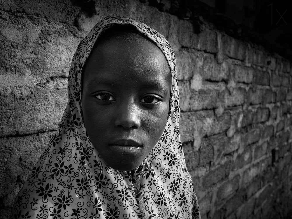 Young Girl's Serious Gaze