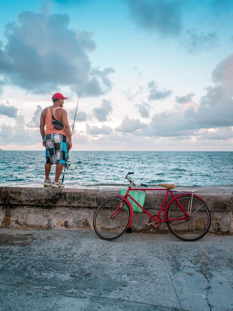 Fisherman With Red Bicycle