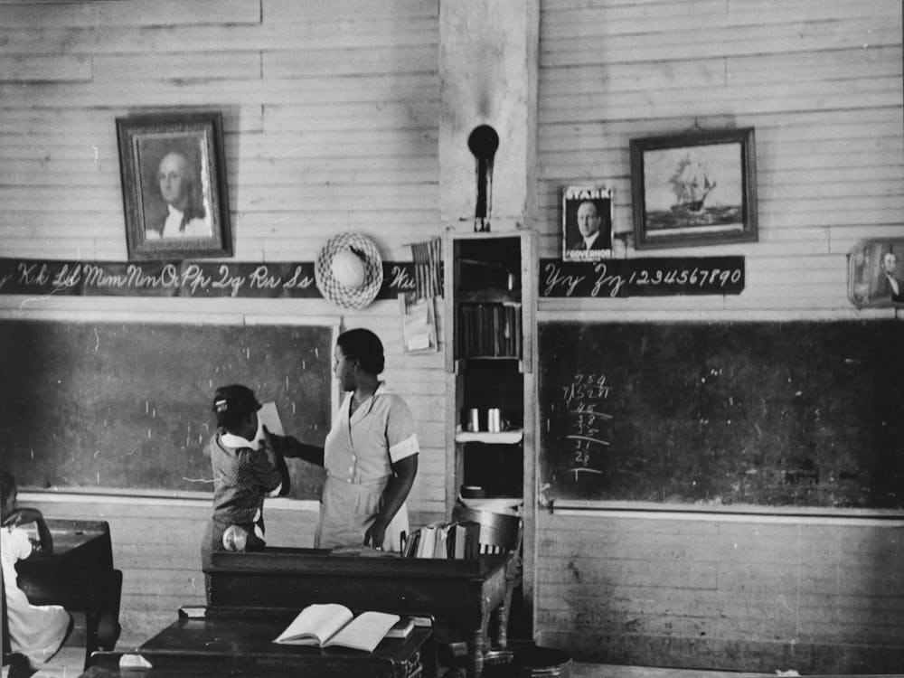 Schoolteacher Explaining Passage To Pupil, La Forge, Missouri, School Attended By Southeast Missouri Farms