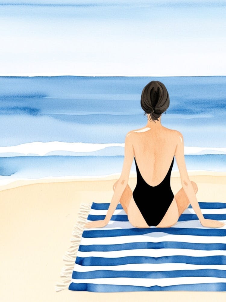 Woman Sitting On A Beach Towel