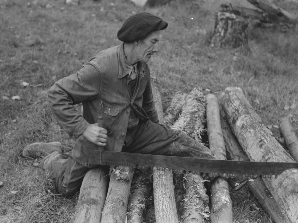 Farmer Sawing Wood Near Bradford, Vermont By Russell Lee