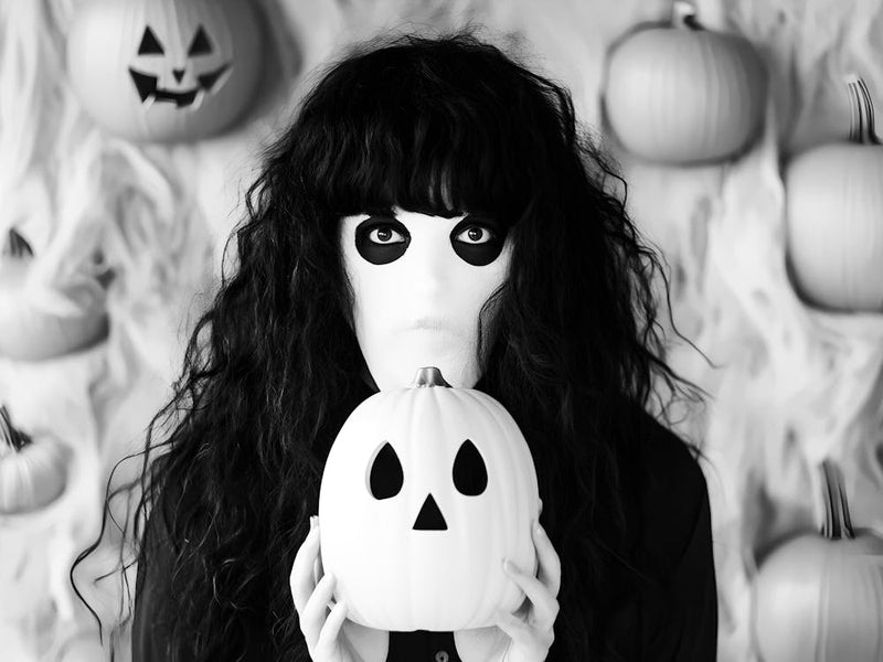 Halloween Girl Holding Pumpkin