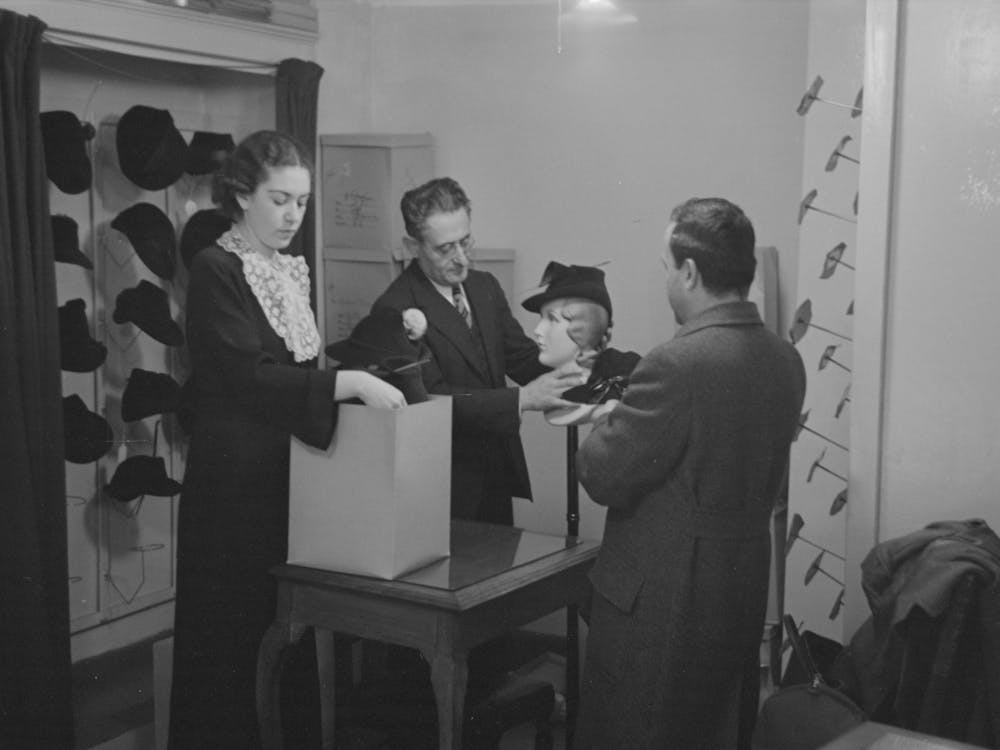 Untitled Photo, Possibly Related To Model Trying On Hat For A Buyer, New York City Showroom, Jersey 4