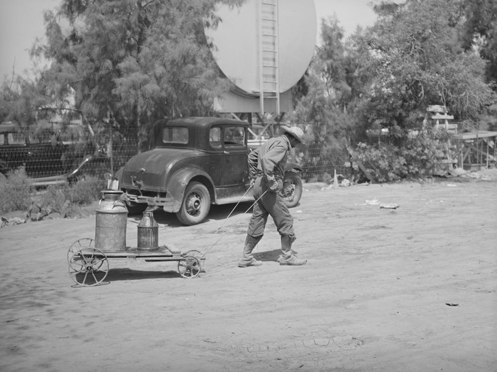 Man Hauling Home Water, Phoenix, Arizona By Russell Lee