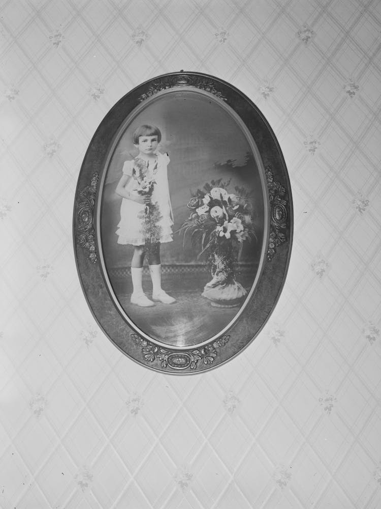 Daughter Of Joseph La Blanc, Pictured In First Communion Dress, Crowley, Louisiana By Russell Lee