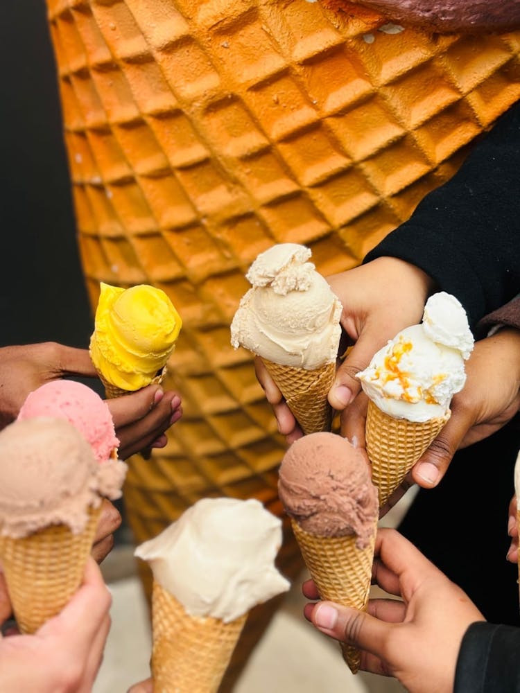 Holding Ice Cream Cones