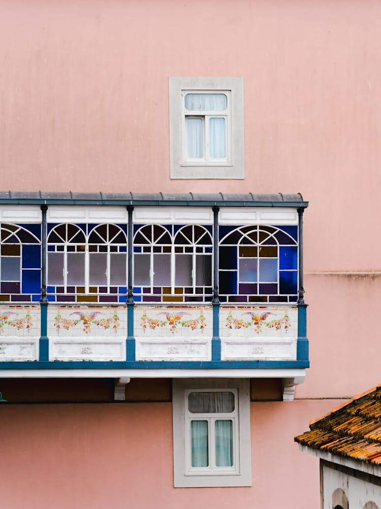 Balconies On A Pink Building | Colorful architecture in Porto | TRavel Photography