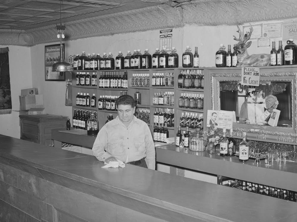 Barkeeper, Penasco, New Mexico By Russell Lee