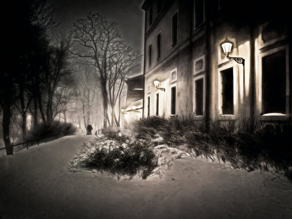 Lone Figure On A Snowy Night Krakow