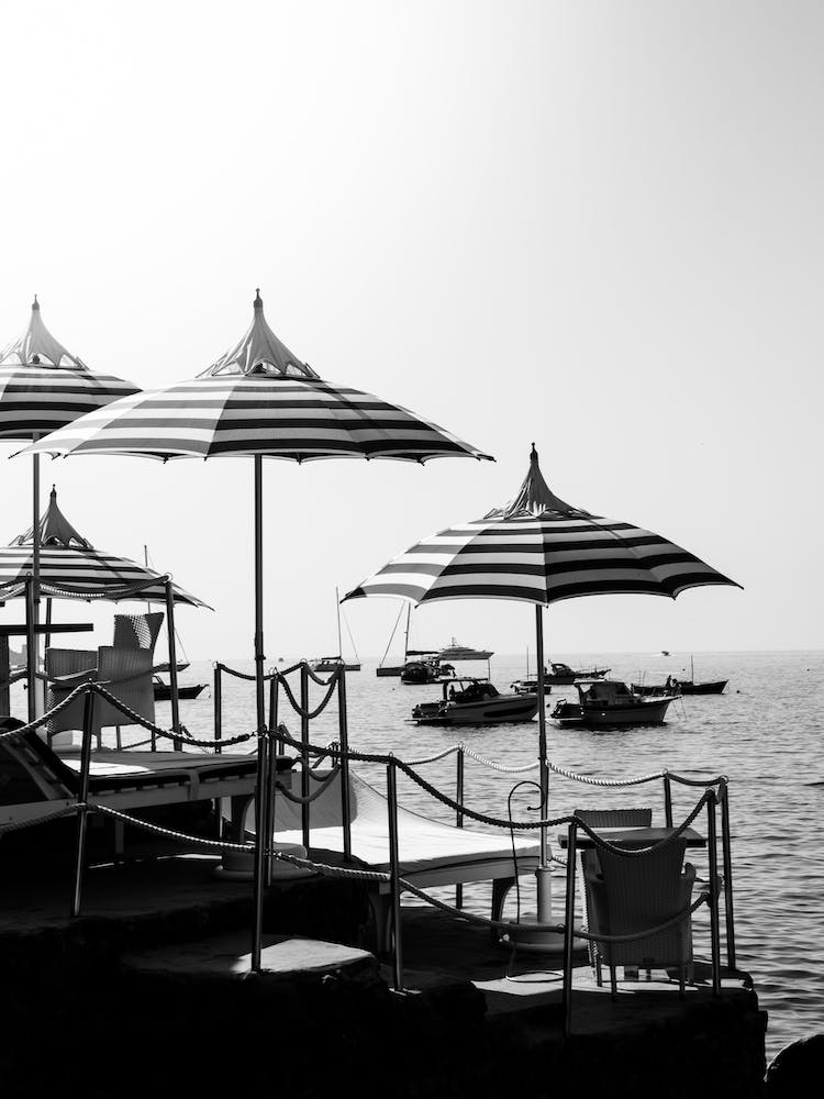 Amalfi Coast Beach Club | Positano Italy |Black and White Beach Umbrellas