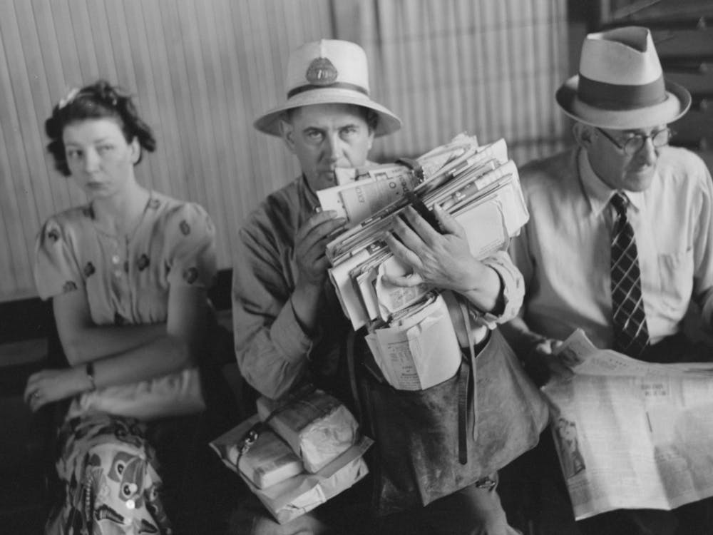 Untitled Photo, Possibly Related To Postman Loaded With Mail Waiting For Streetcar, Streetcar Terminal, Oklahoma