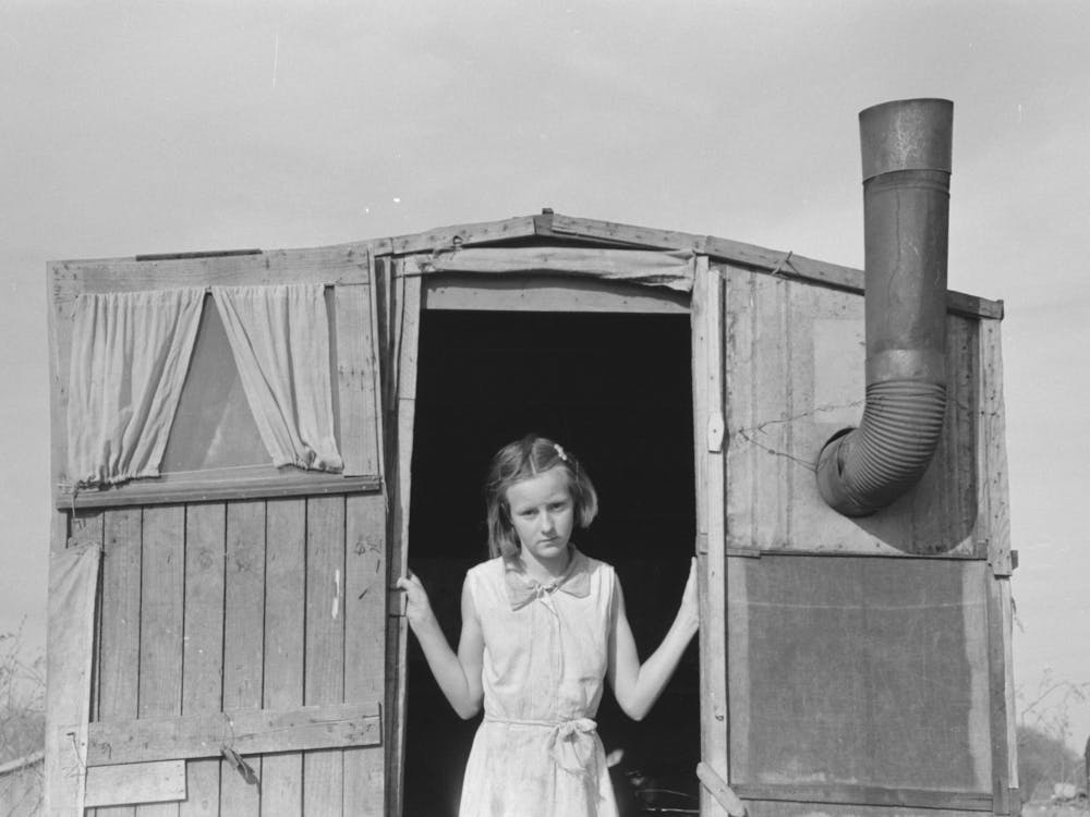 Daughter Of Migrant In Doorway Of Trailer, Sebastin, Texas By Russell Lee 1
