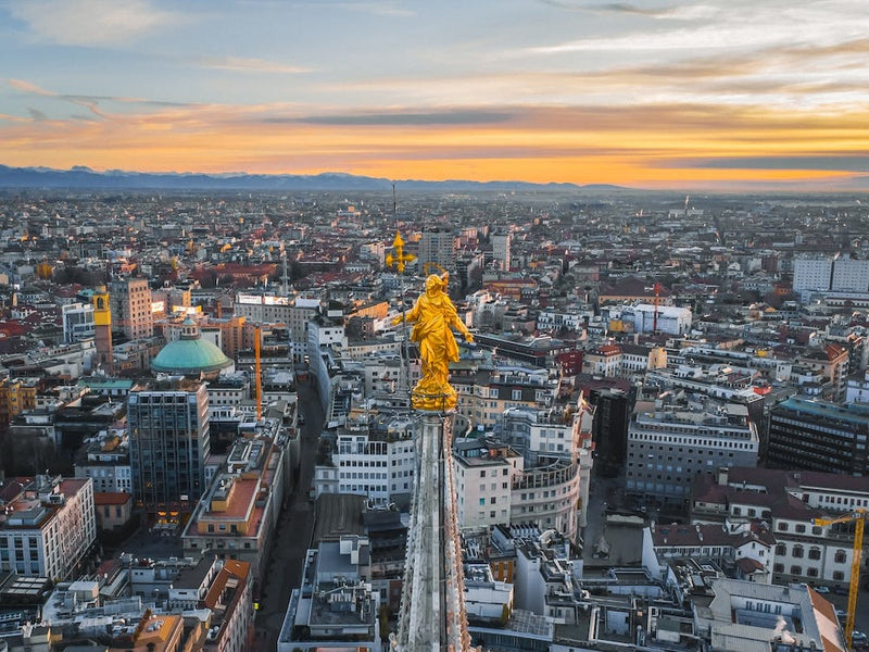 Aerial photography on statue of the Madonna on the spire of Duomo in Milano