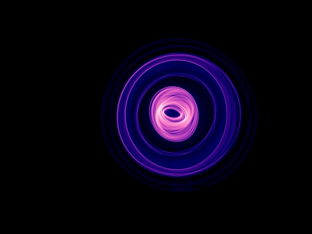 Glowing Abstract Curved Blue And Magenta Lines