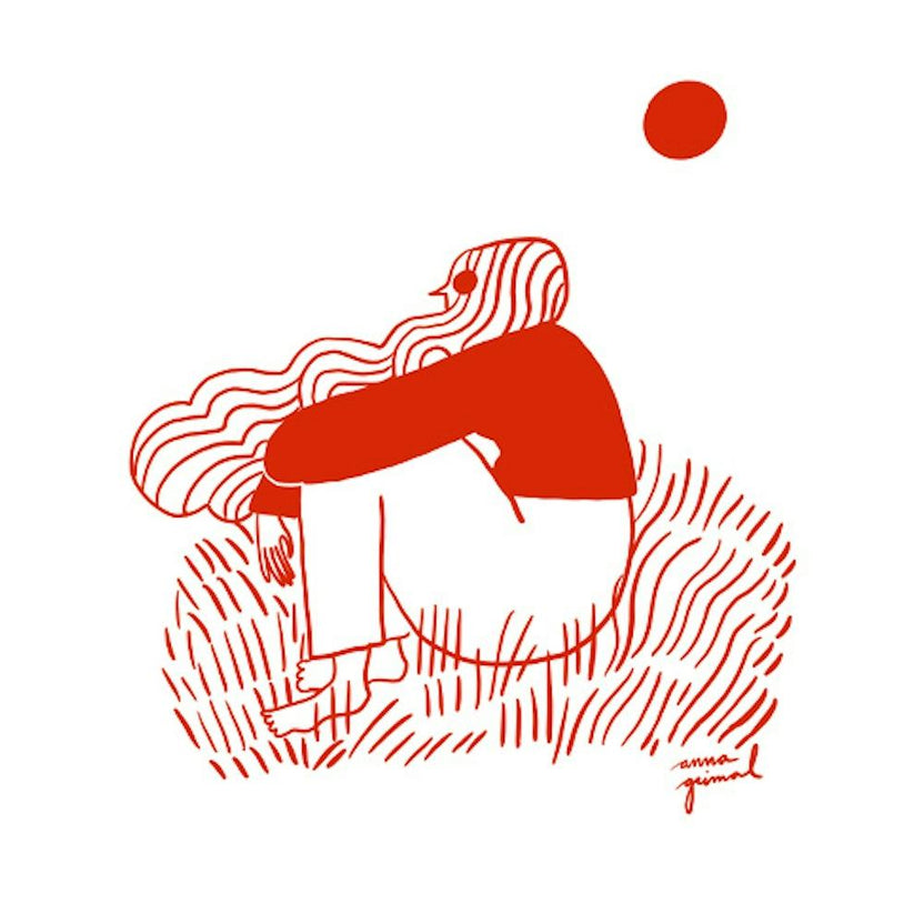 Person Sitting In The Grass