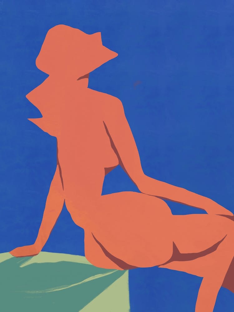 Nude Woman Sitting On A Rock