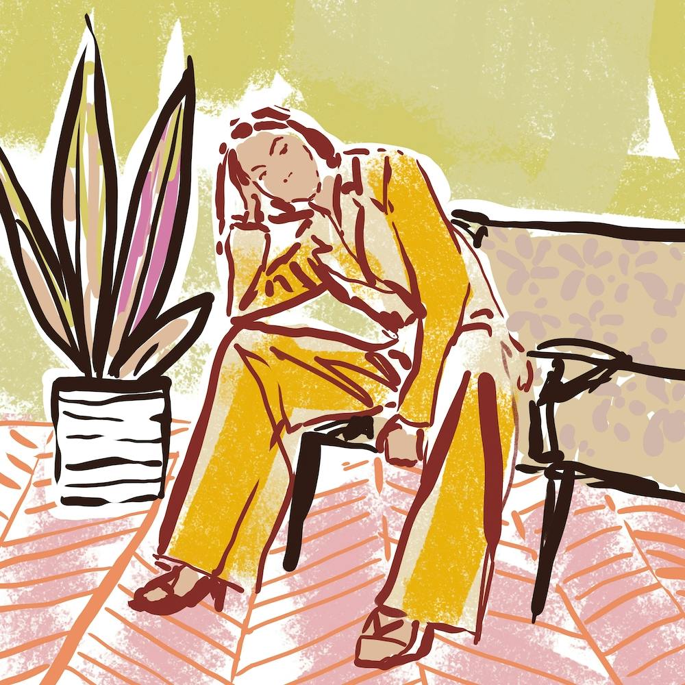 Woman Sitting On A Couch