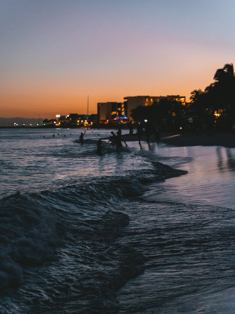 Sunset Waves At The Beach Side
