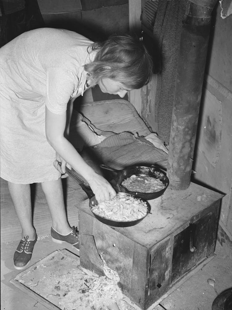 White Migrant Woman Cooking Cabbage In Tent Home, Edinburg, Texas By Russell Lee