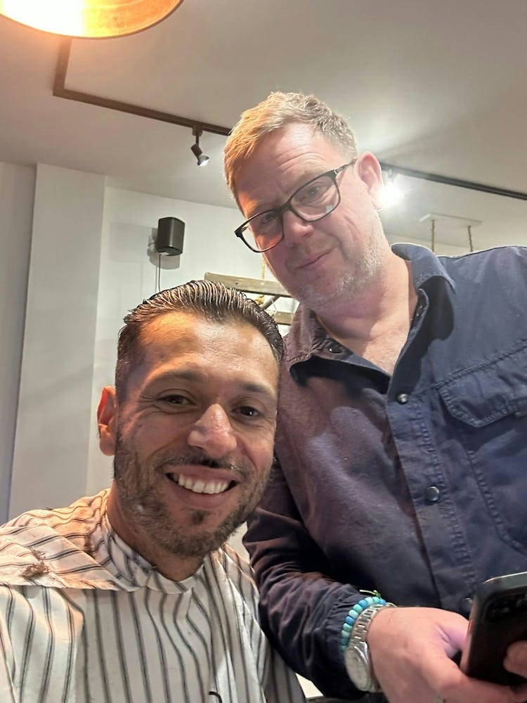 Two Men In A Barber Shop