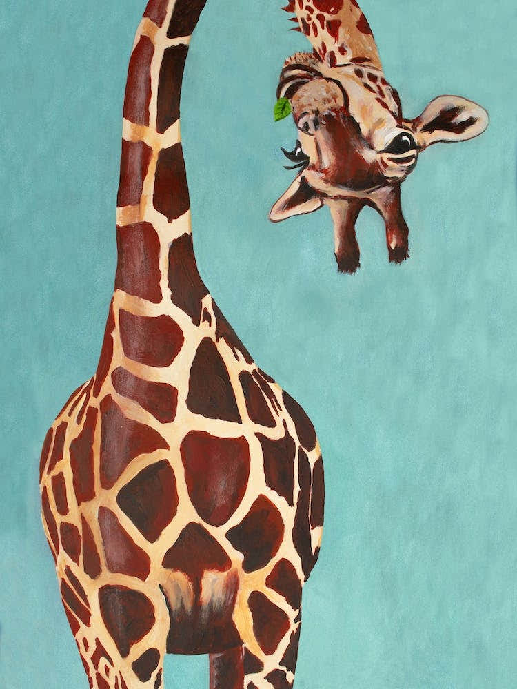 Giraffe With Green Leaf