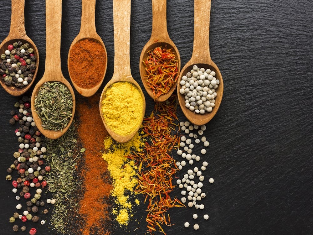 Spices On Wooden Spoons