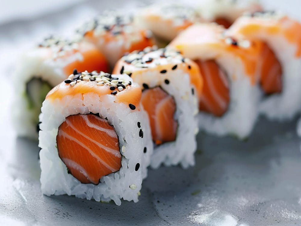 Photo Of Salmon Maki Roll With White Backdrop Taken
