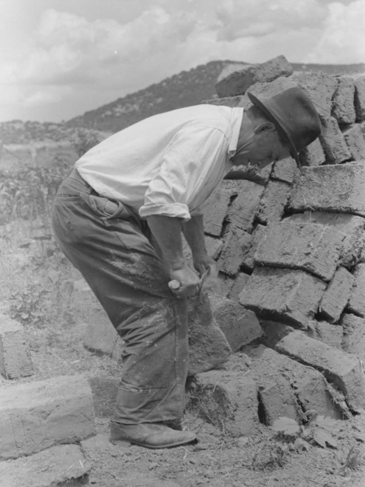 Removing The Rough Edges From Adobe Bricks With Trowel, Penasco, New Mexico By Russell Lee