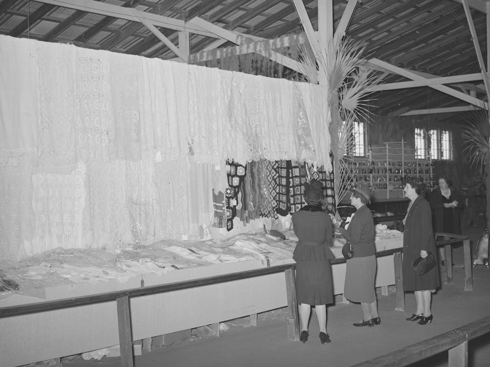 Women Looking At Knitting Exhibit At Gonzales County Fair, Gonzales, Texas By Russell Lee