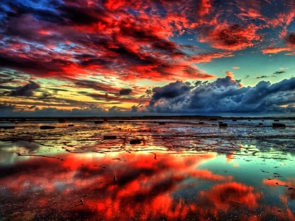Sunset Reflected In Water